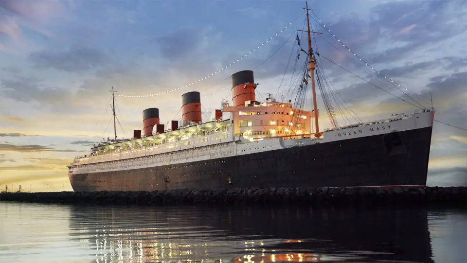 Historic cruise liner docked sunset