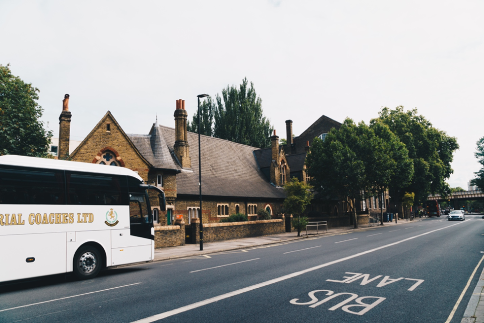 Charter bus on urban street