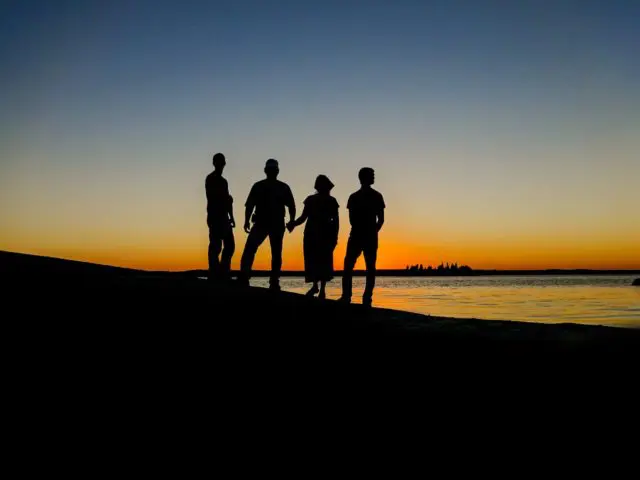 Group Sunset Beach Gathering