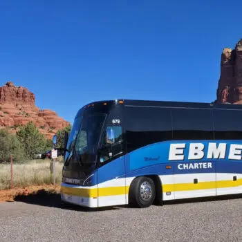 Charter bus in scenic landscape