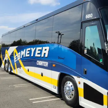 Blue yellow charter bus service