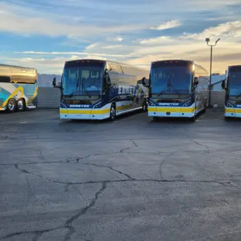 Ebmeyer charter bus lineup outdoors