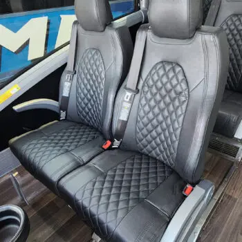 Luxurious black charter bus seating