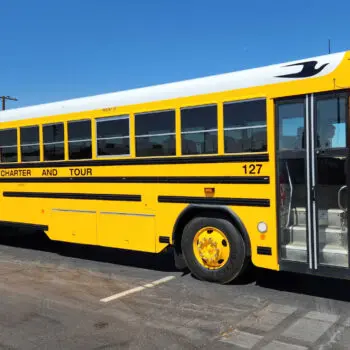 Yellow charter bus exterior view