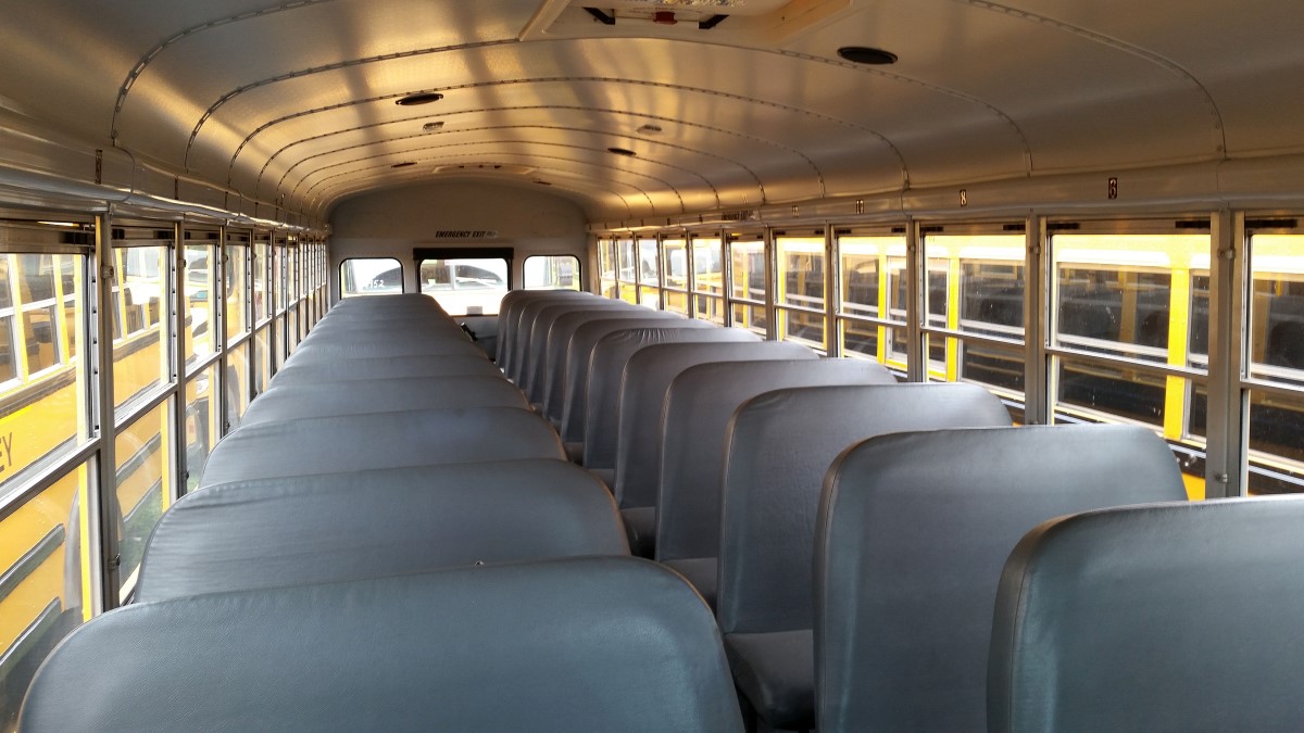 Empty charter bus interior seats