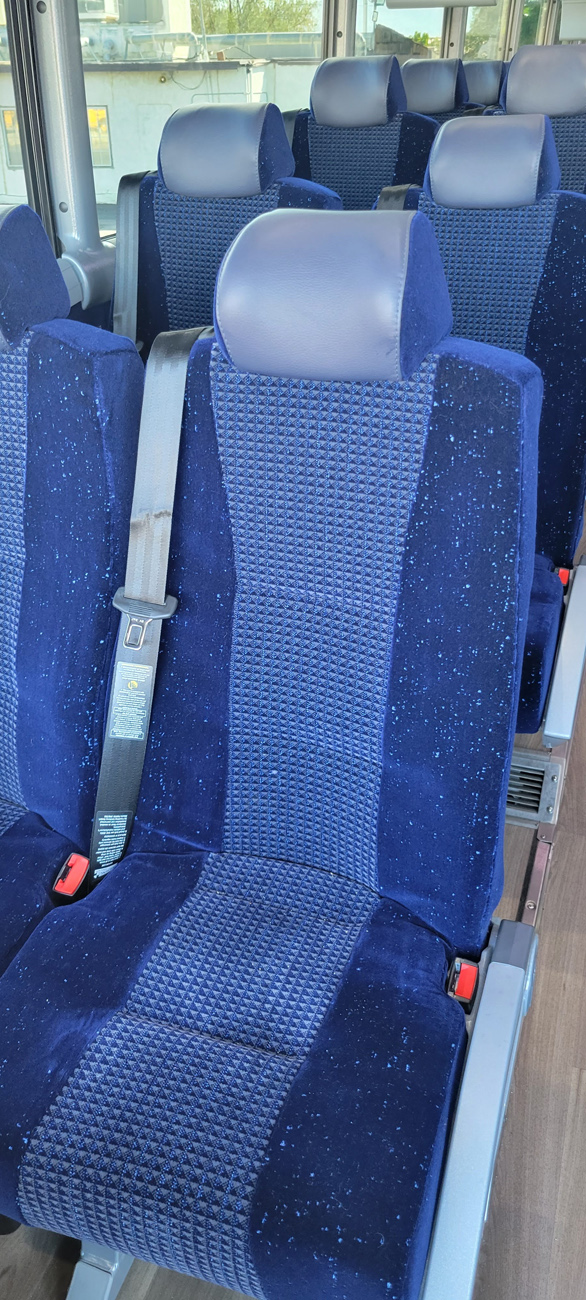 Comfortable bus seats seatbelts charter