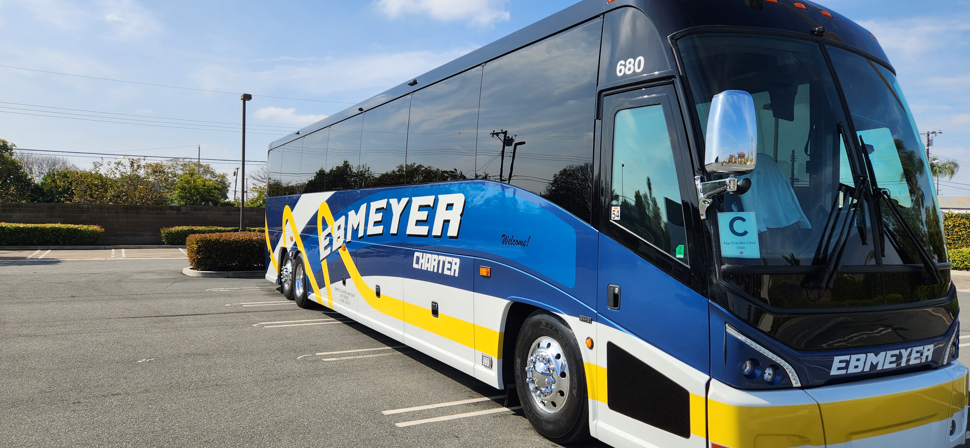 Blue yellow charter bus service