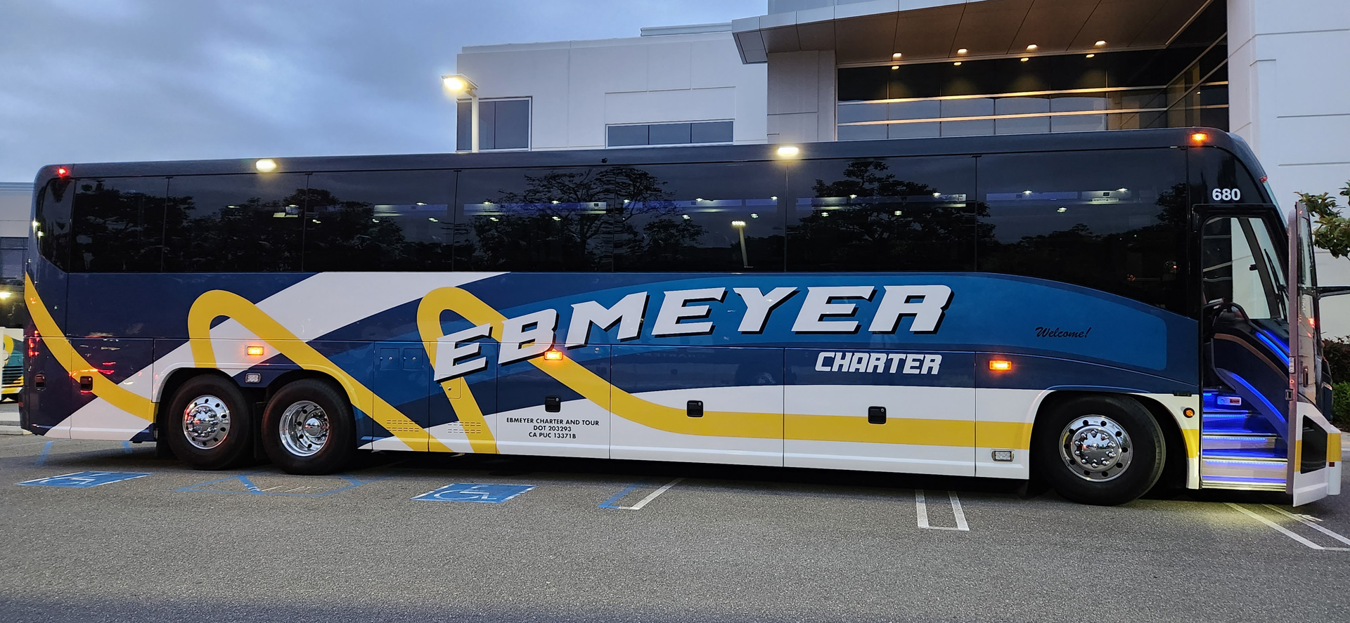 Charter bus parked outside building