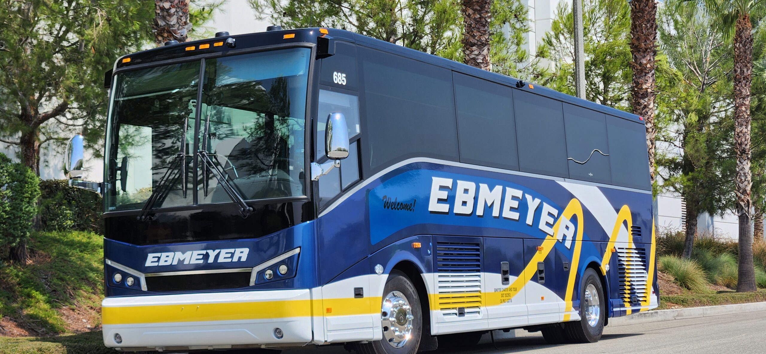 Charter bus driving on road