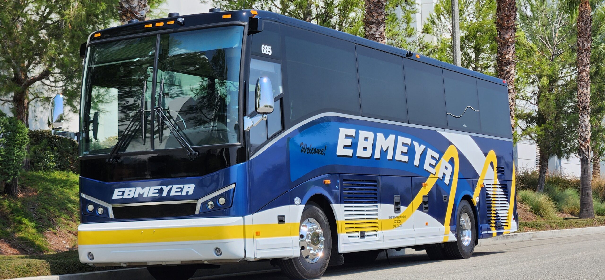 Blue charter bus parked outside